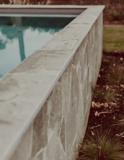 Closeup photo of crazy paving around pool