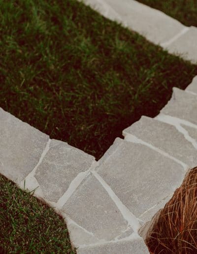 Photo of stone retaining walls with grass steps