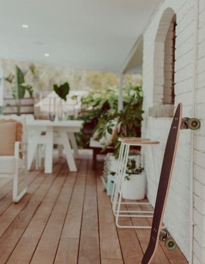 Photo of deck and bar area with skateboard