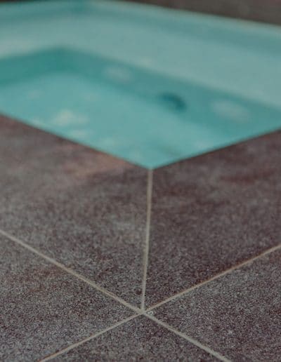 Closeup photo of paving next to pool